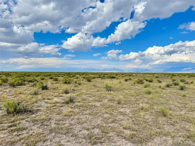 a view of a pathway with a city