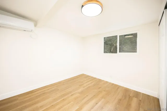 a view of a small space with a wooden floor