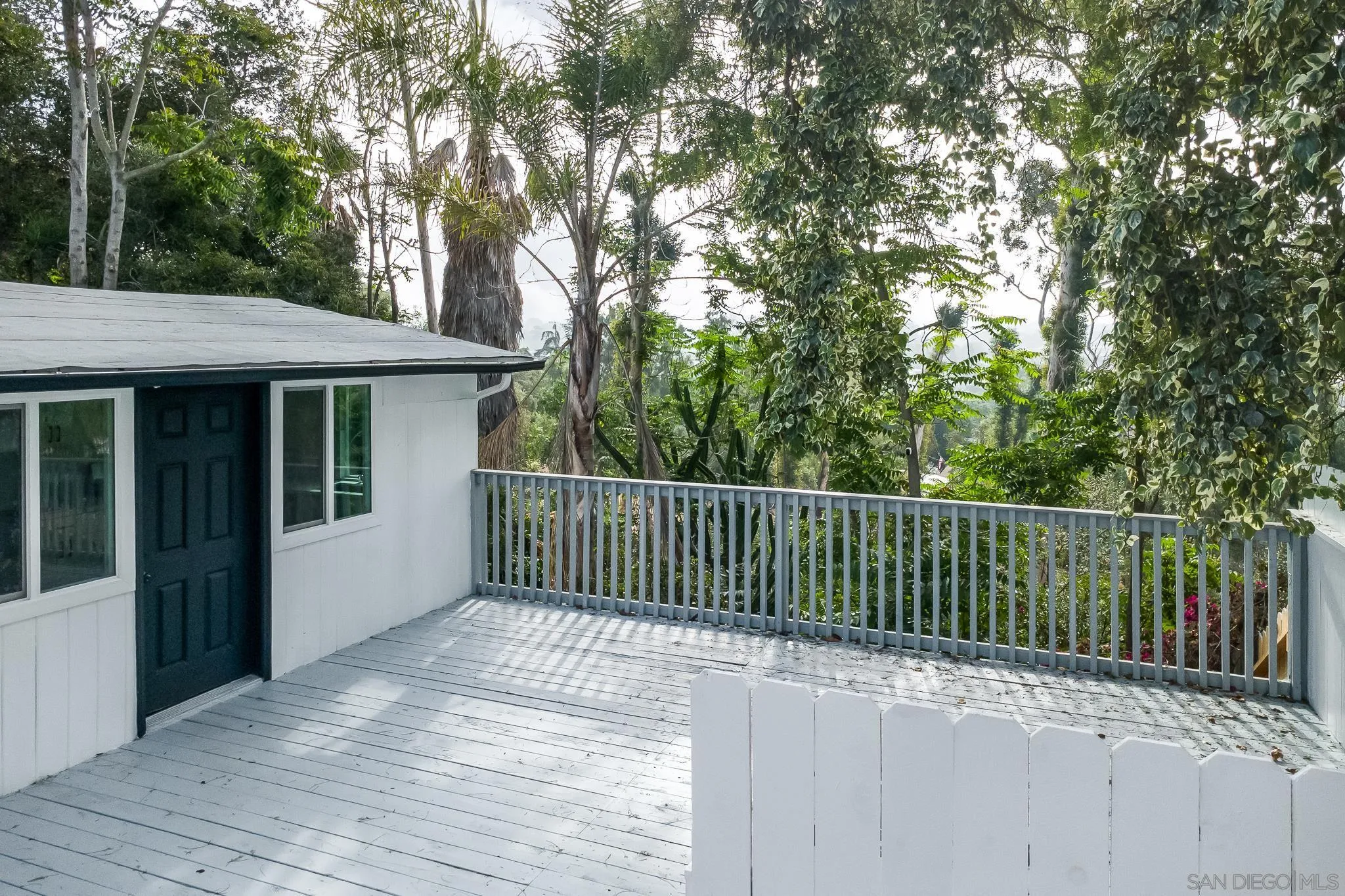 678 Robby Way Fallbrook, CA 92028 - Photo 3 of 36 a balcony with trees in front of it