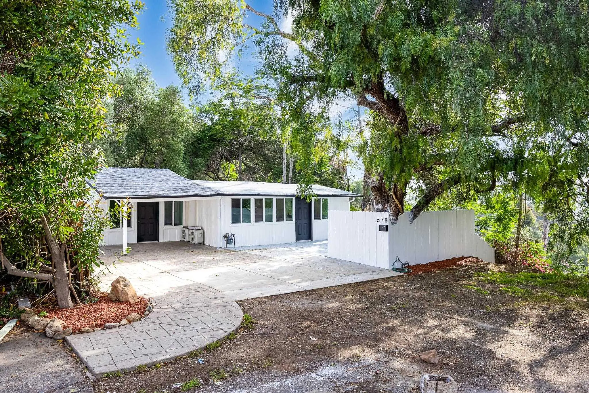 678 Robby Way Fallbrook, CA 92028 - Photo 35 of 36 a view of a house with a yard