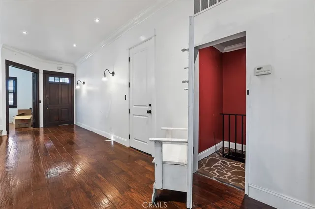 a view of livingroom with hardwood floor and a ceiling fan