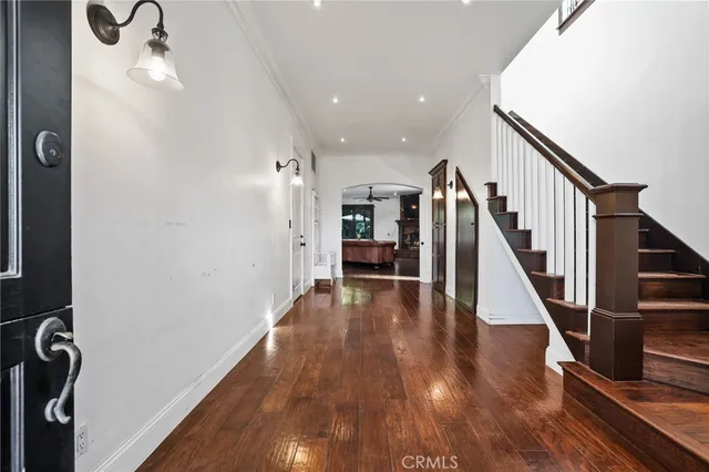 a view of entryway with wooden floor