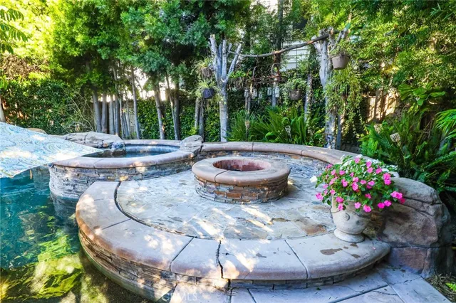 a view of a swimming pool in the backyard
