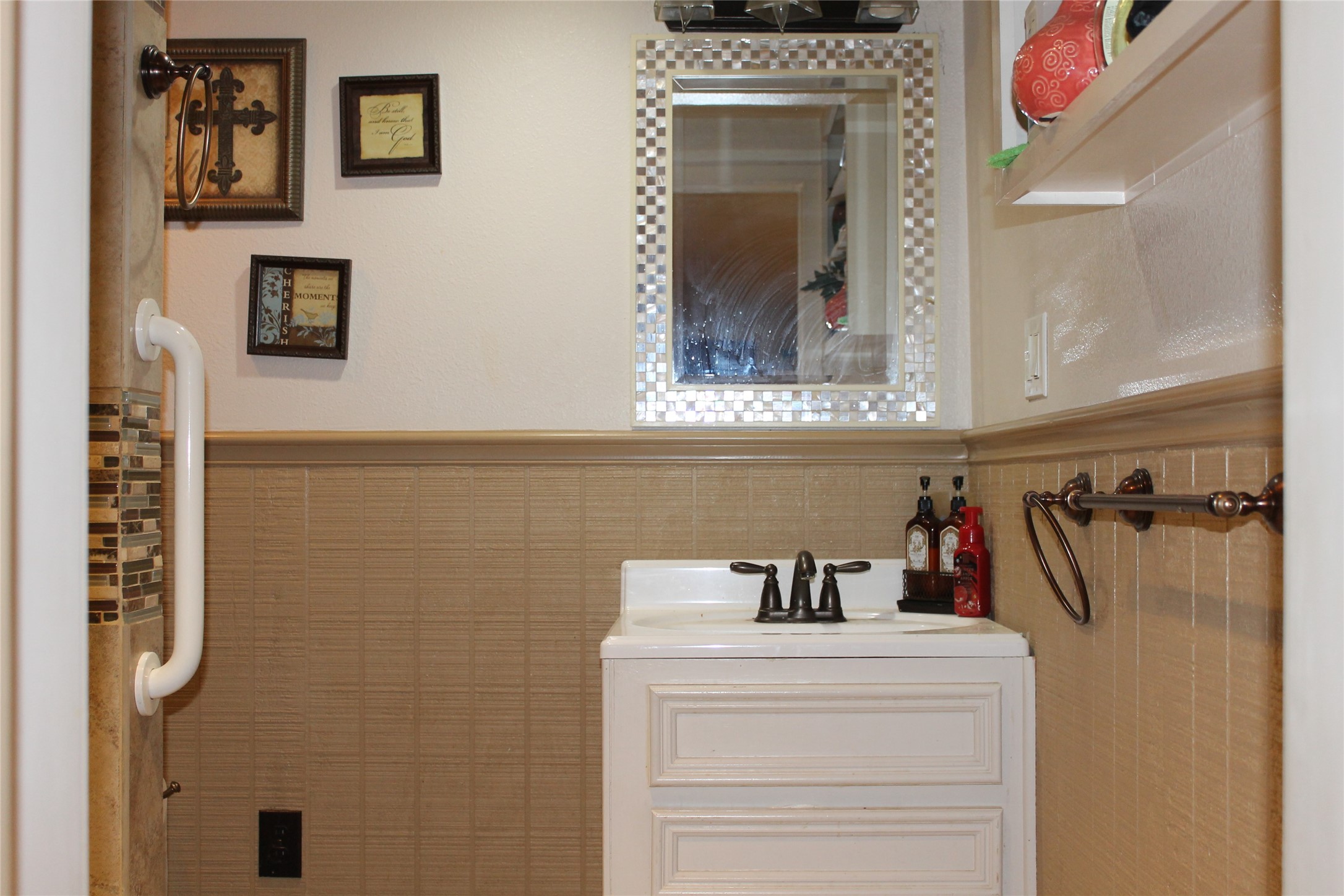 1111 Spur 529 Rosenberg, TX 77471 - Photo 7 of 41 a view of a bathroom with a sink and a mirror