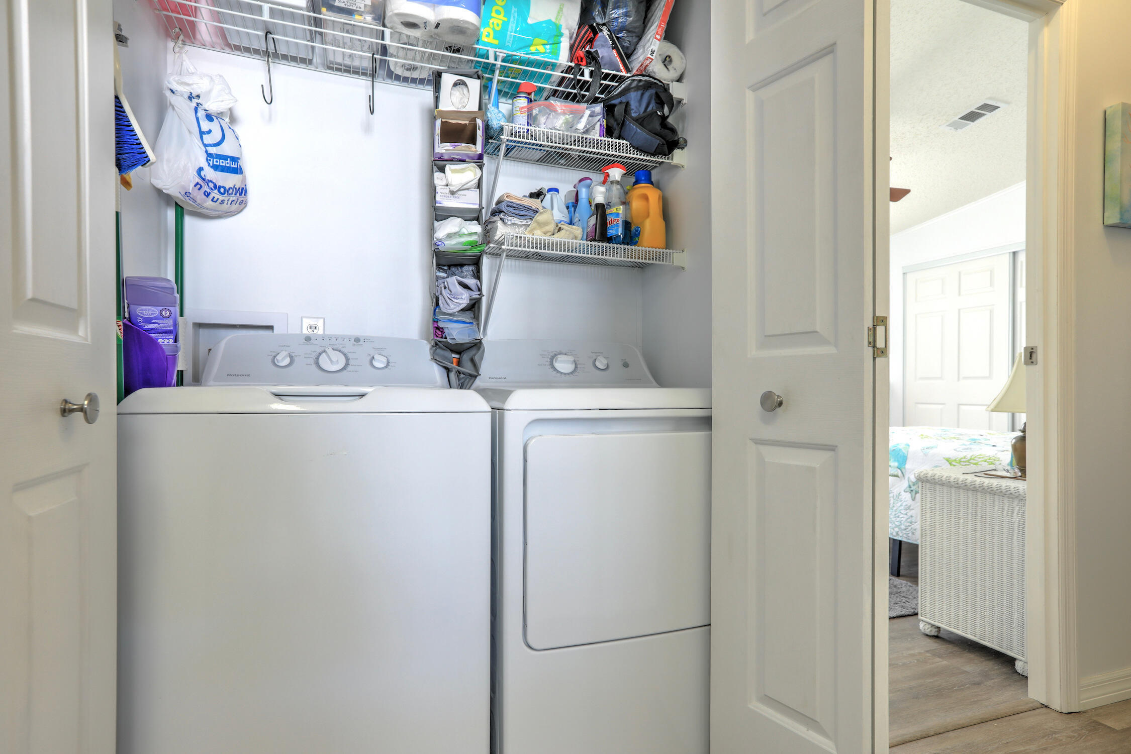 7576 Chasta Road Micco, FL 32976 - Photo 18 of 27 a utility room with dryer and washer