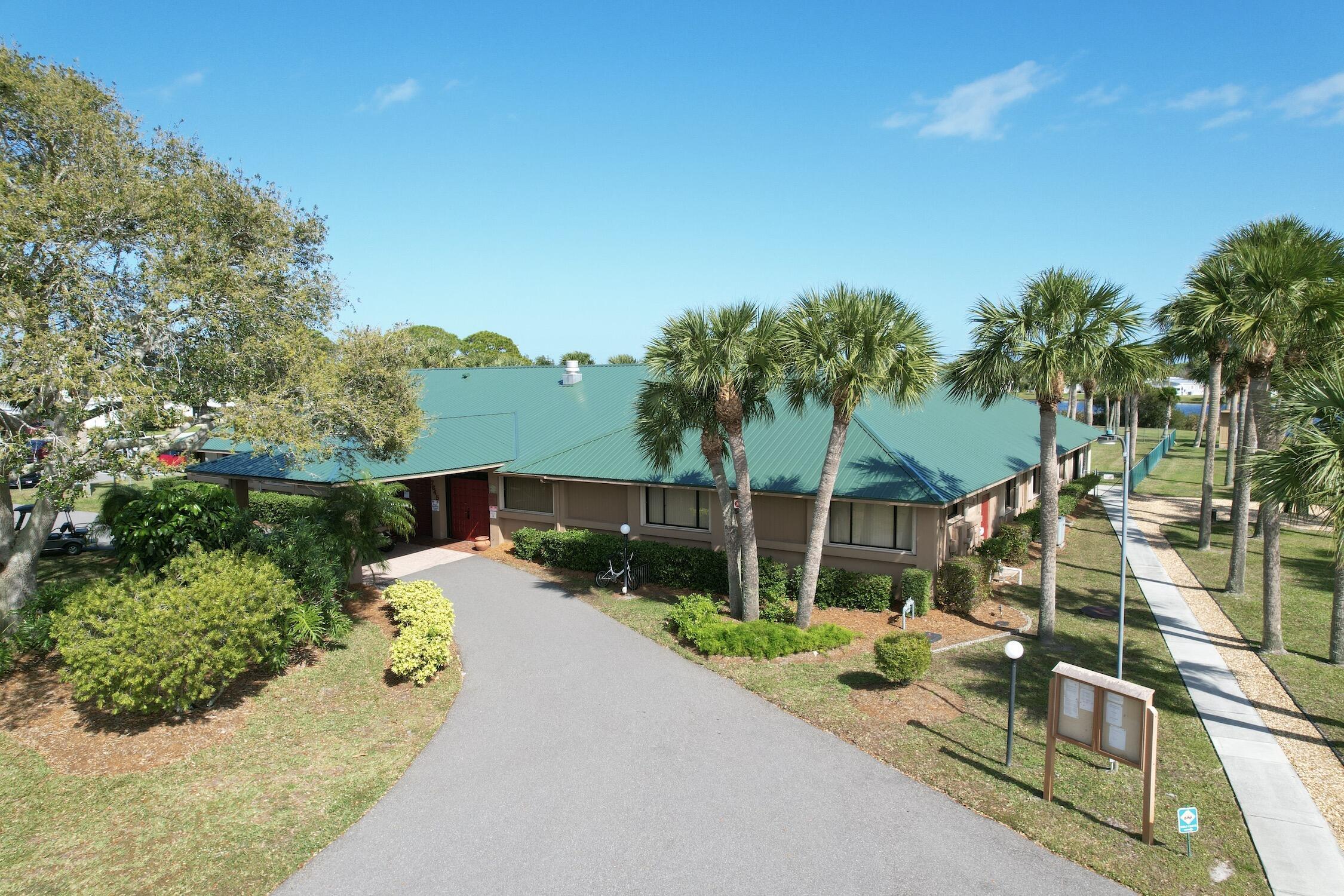 7576 Chasta Road Micco, FL 32976 - Photo 21 of 27 a view of a garden with a patio