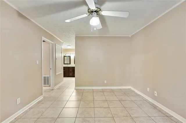 a bathroom with a toilet sink double and mirror