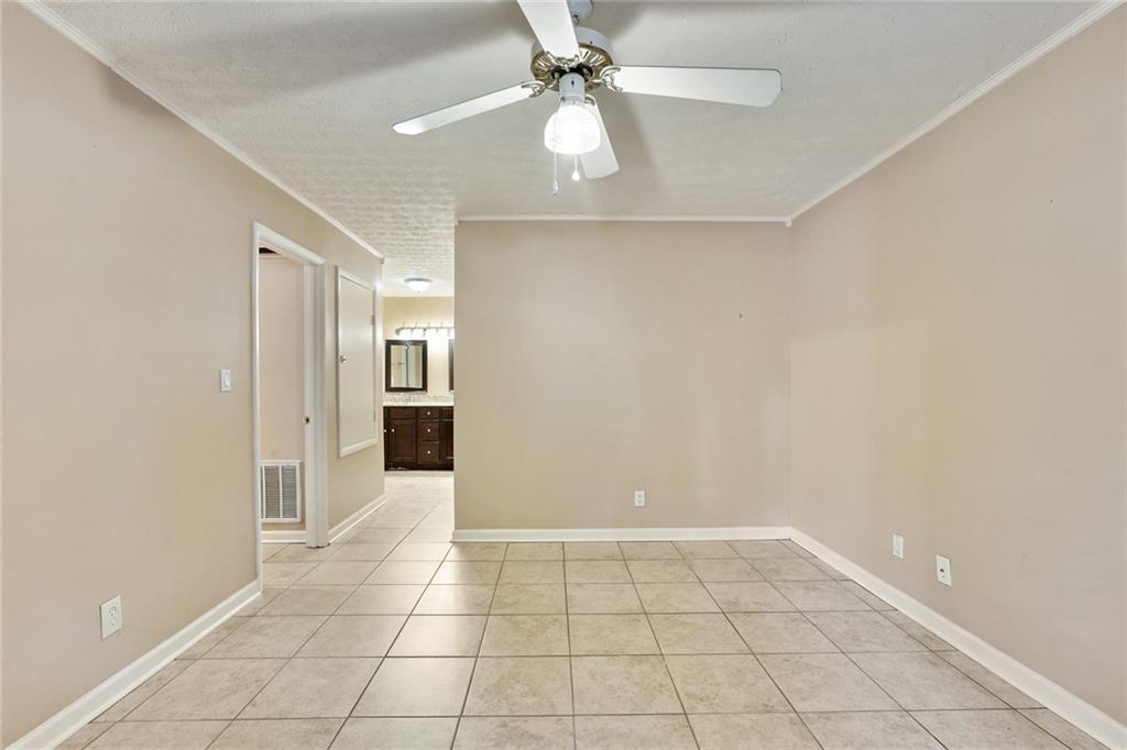 2949 Torreya Way Southeast Marietta, GA 30067 - Photo 14 of 23 wooden floor in an empty room with a window