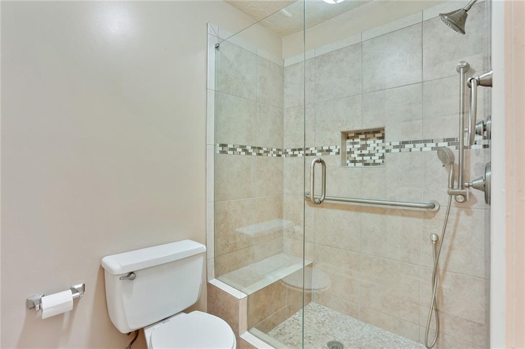 2949 Torreya Way Southeast Marietta, GA 30067 - Photo 16 of 23 a bathroom with a toilet and a shower