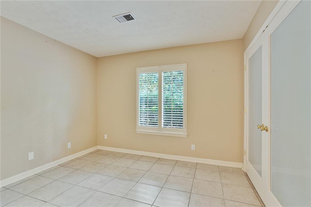 2949 Torreya Way Southeast Marietta, GA 30067 - Photo 18 of 23 a view of an empty room with a window