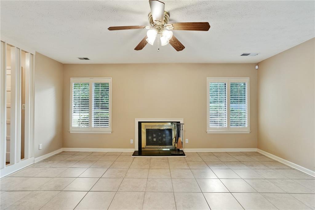 2949 Torreya Way Southeast Marietta, GA 30067 - Photo 4 of 23 a view of an empty room with a window