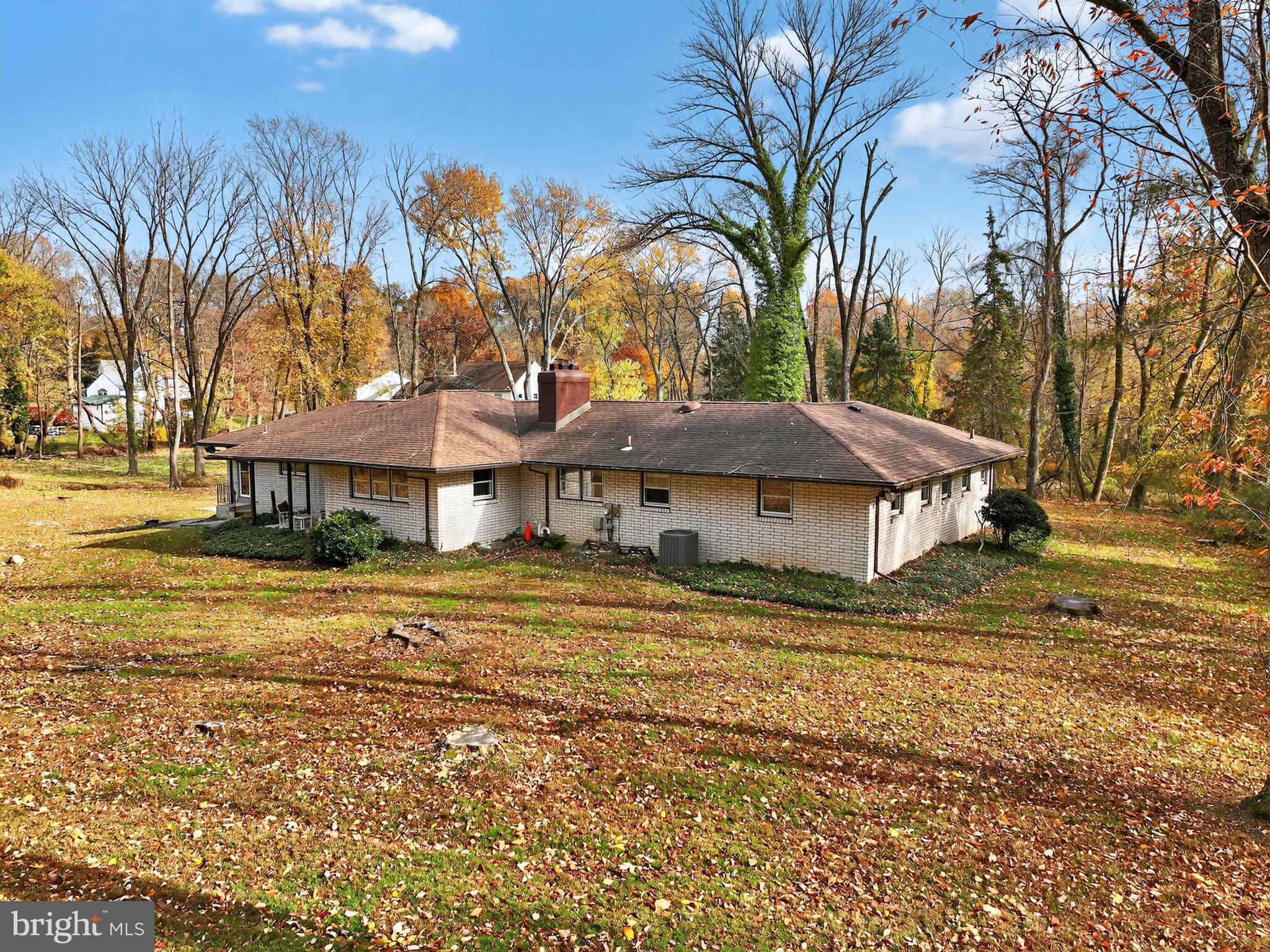 1013 Glen Road Wallingford, PA 19086 - Photo 12 of 45 a view of a house with a yard and tree s