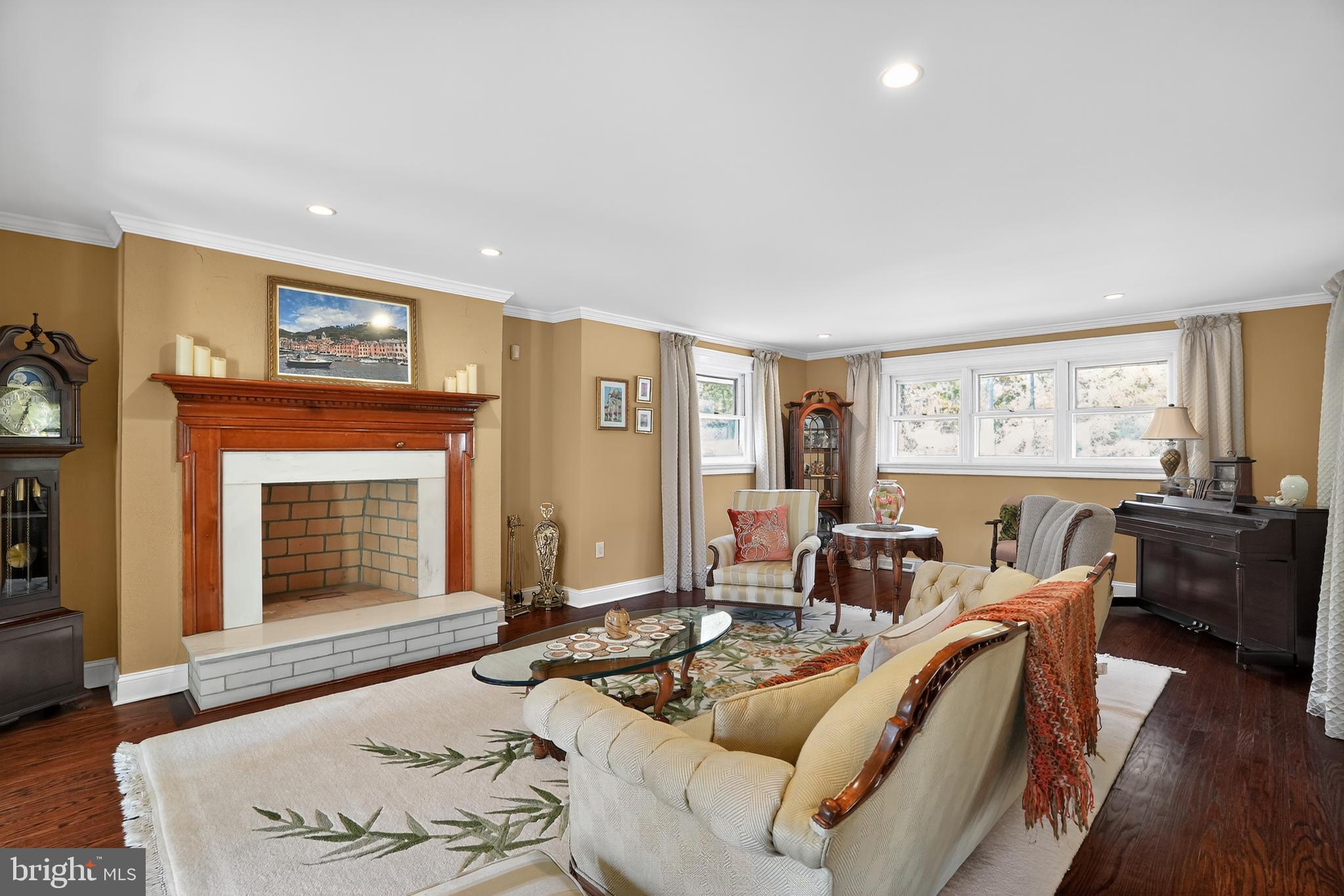 1013 Glen Road Wallingford, PA 19086 - Photo 21 of 45 a living room with furniture and a fireplace