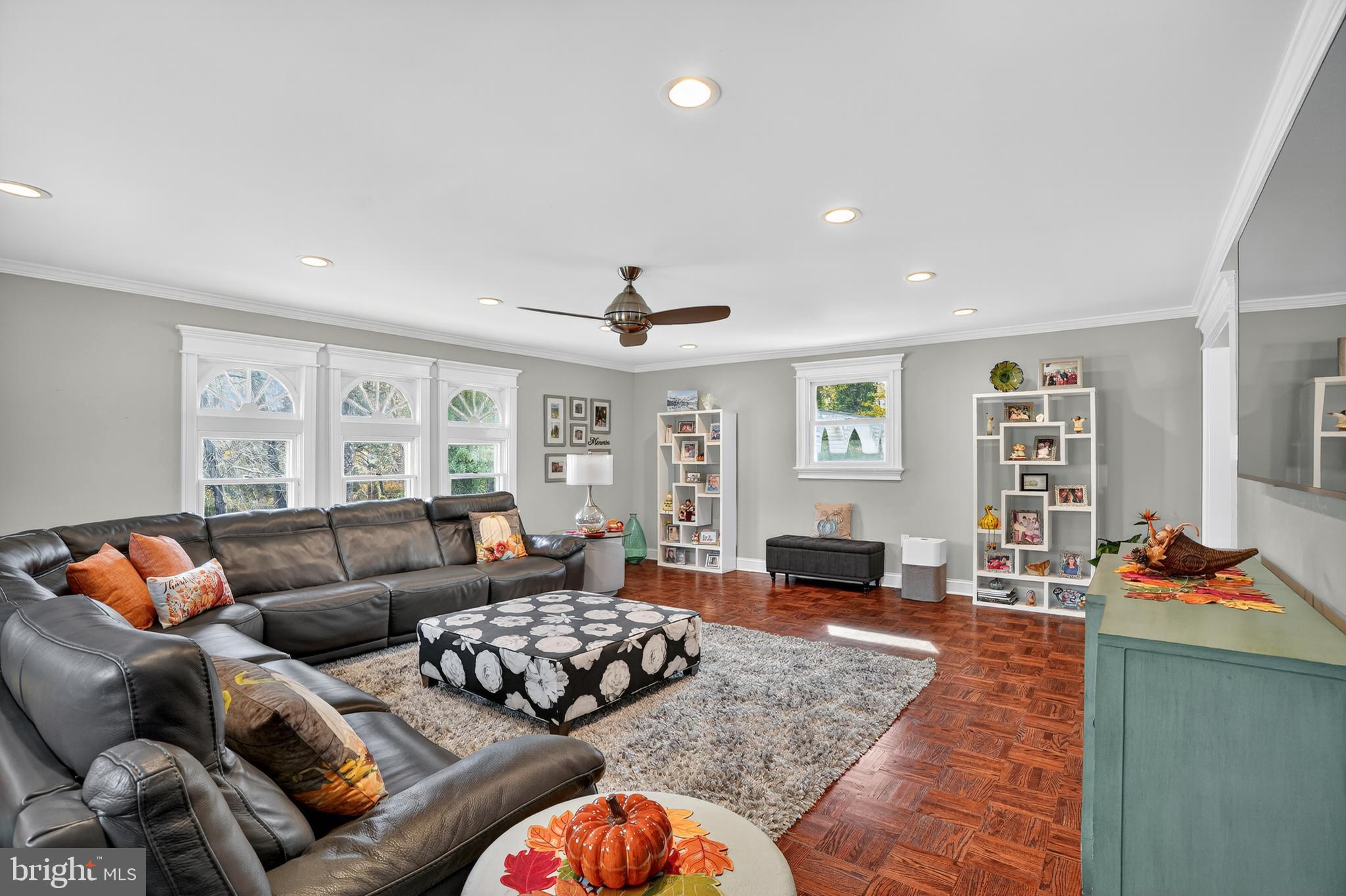 1013 Glen Road Wallingford, PA 19086 - Photo 24 of 45 a living room with furniture ceiling fan and a window