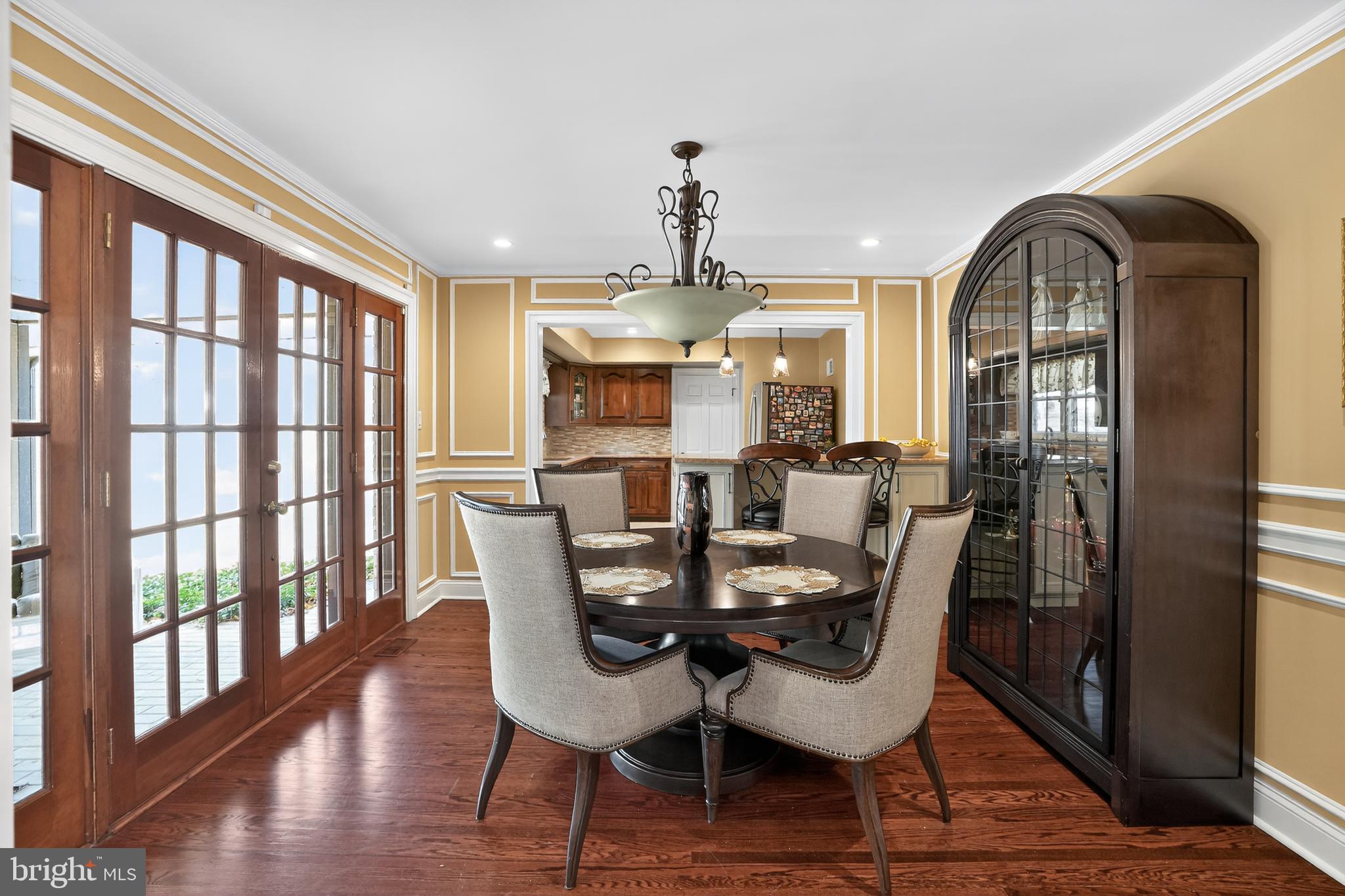1013 Glen Road Wallingford, PA 19086 - Photo 30 of 45 a view of a dining room with furniture window and wooden floor