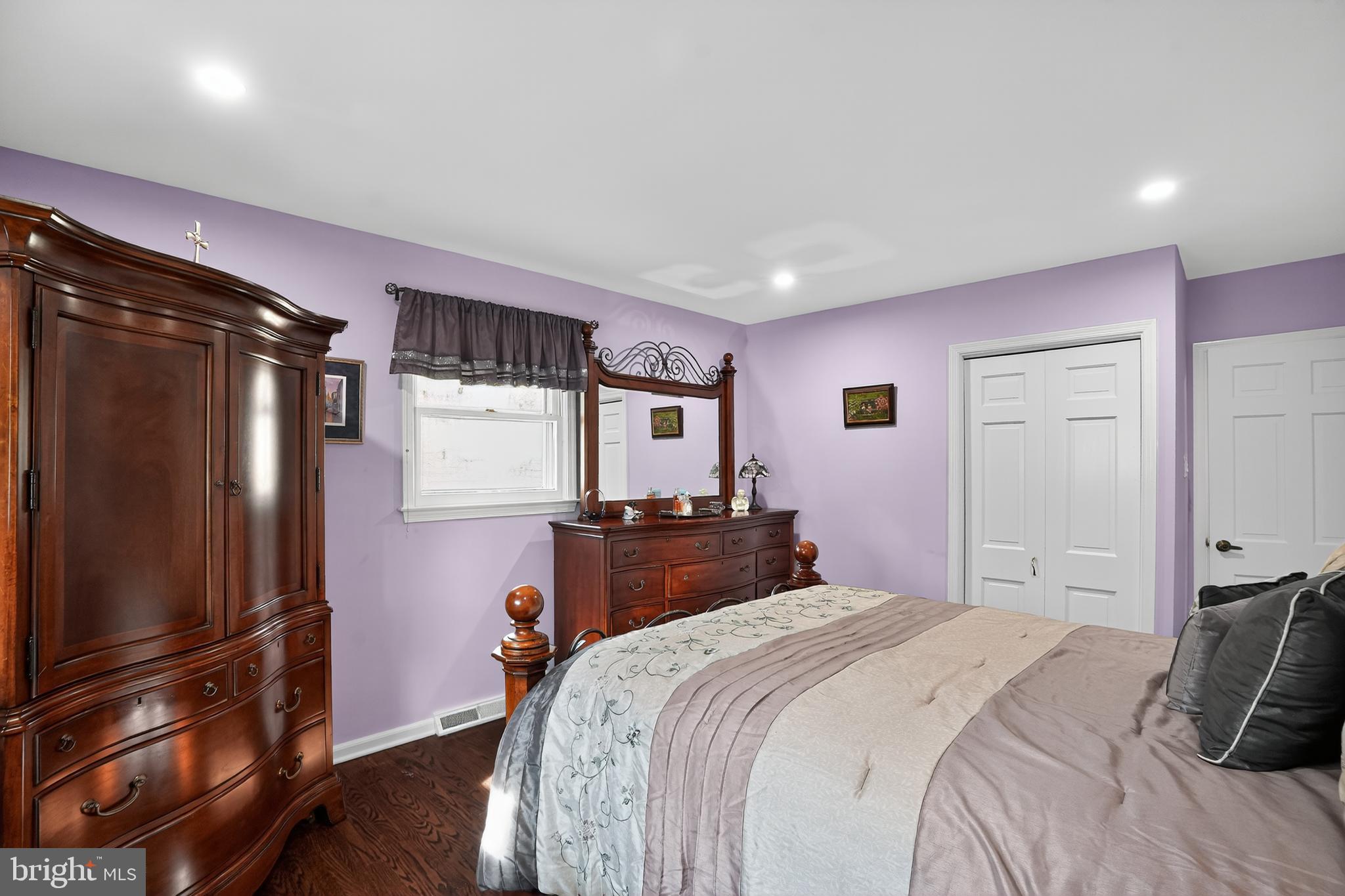 1013 Glen Road Wallingford, PA 19086 - Photo 31 of 45 a bedroom with a bed dresser and a large mirror