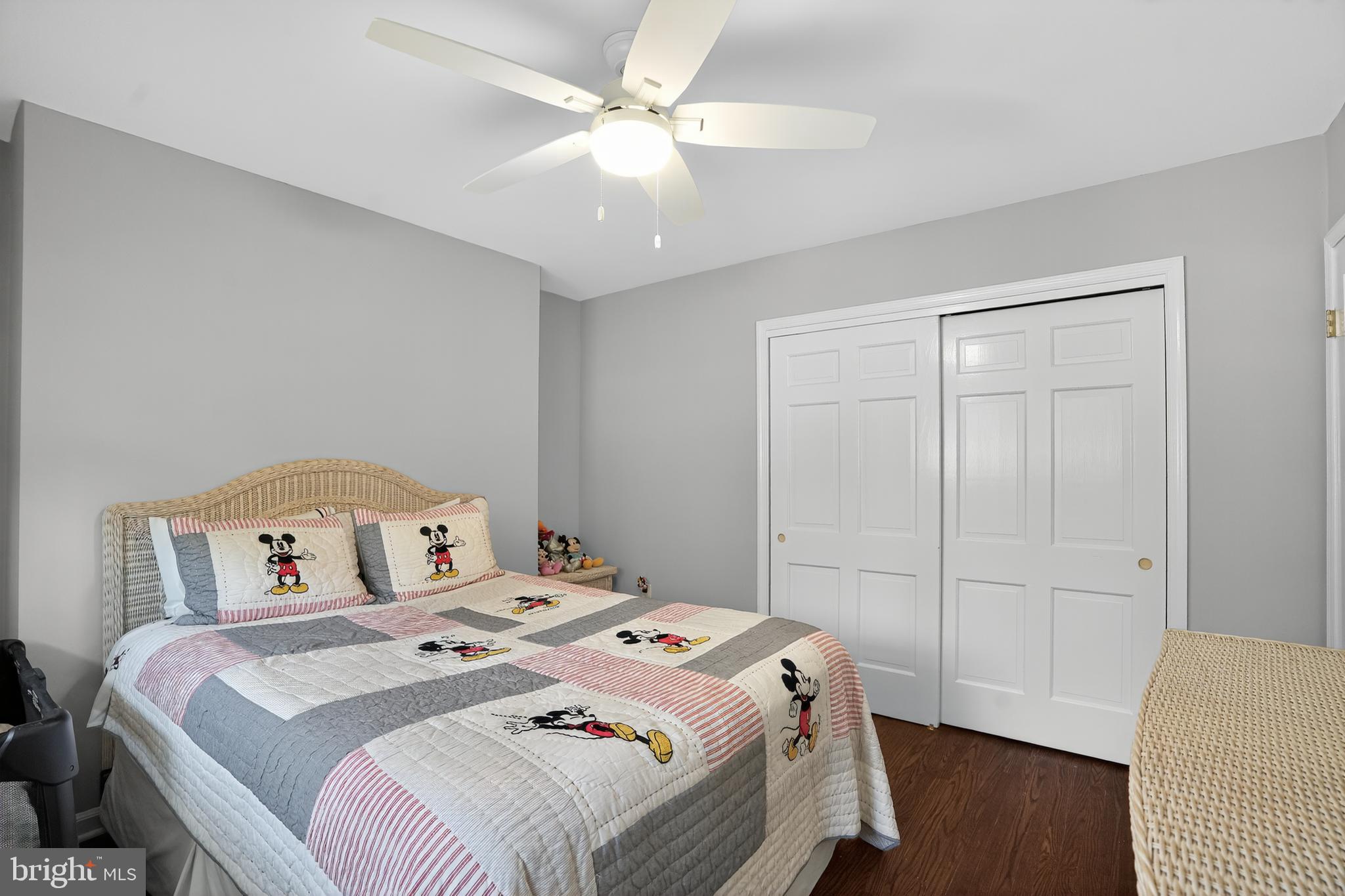 1013 Glen Road Wallingford, PA 19086 - Photo 33 of 45 a bedroom with a bed and a chandelier