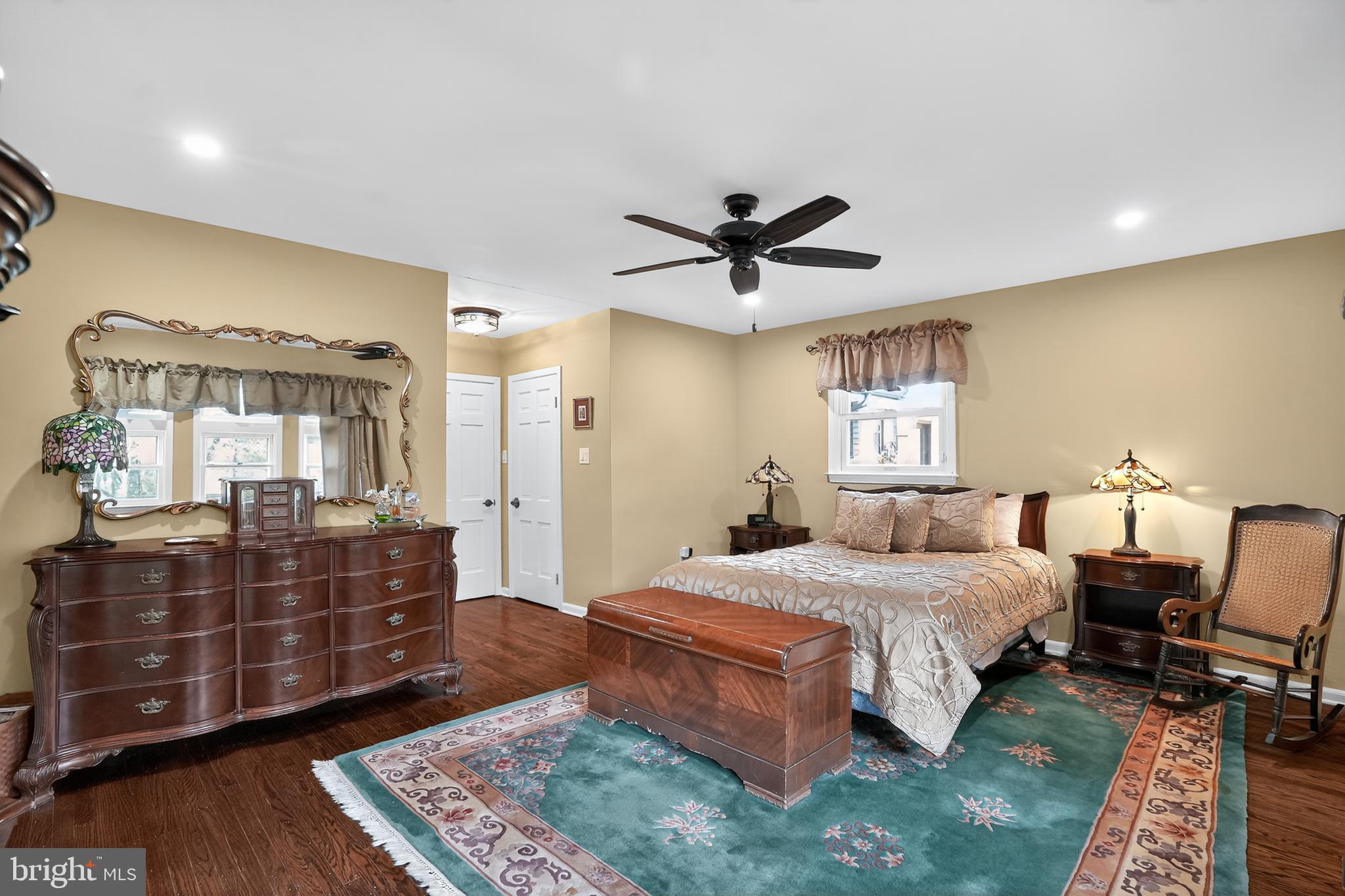 1013 Glen Road Wallingford, PA 19086 - Photo 36 of 45 a bedroom with a bed and wooden floor