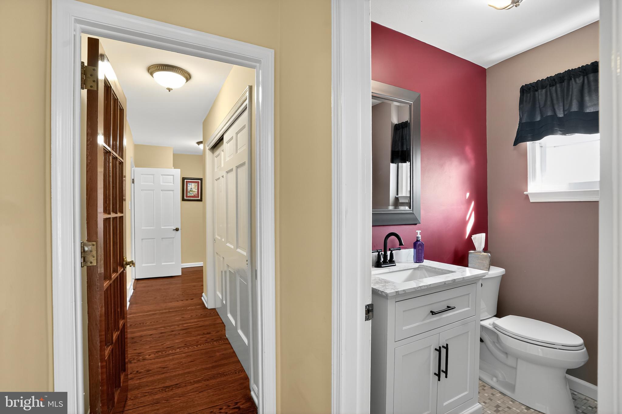 1013 Glen Road Wallingford, PA 19086 - Photo 41 of 45 a bathroom with a sink a toilet a mirror and shower