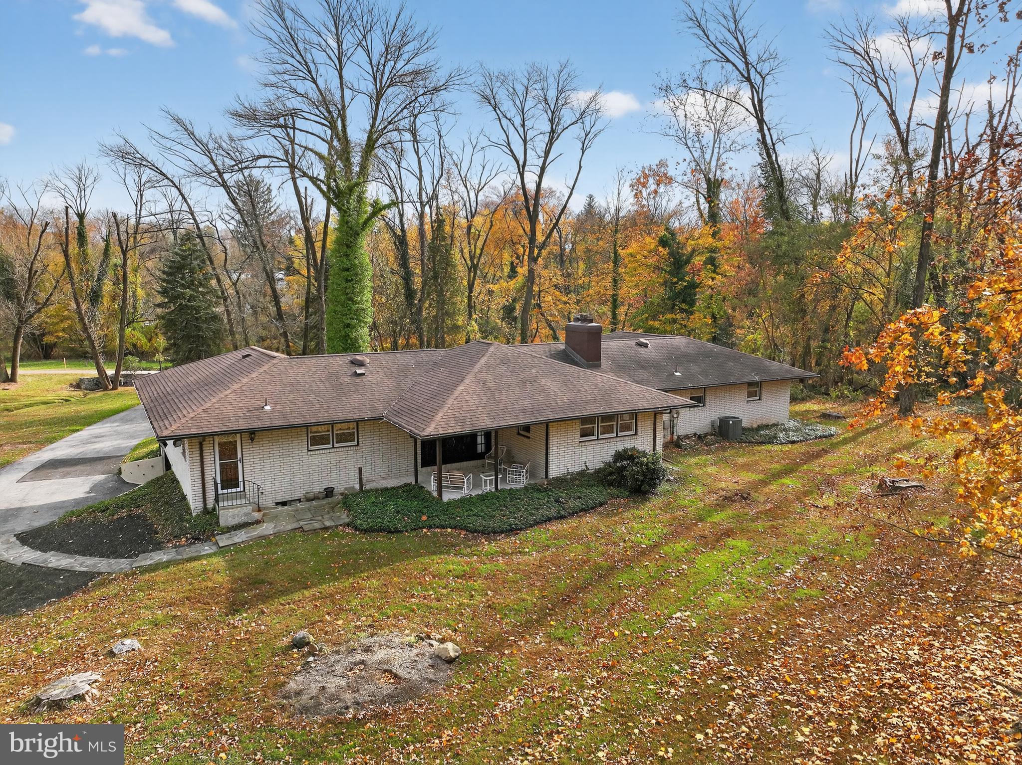 1013 Glen Road Wallingford, PA 19086 - Photo 6 of 45 a view of a house with a big yard and large tree