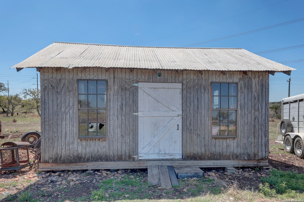 1443 Gina Road Harper, TX 78631 - Photo 27 of 49 a backyard of a house