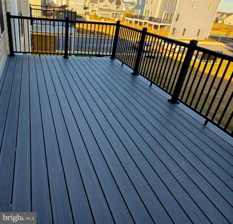 a balcony with wooden floor