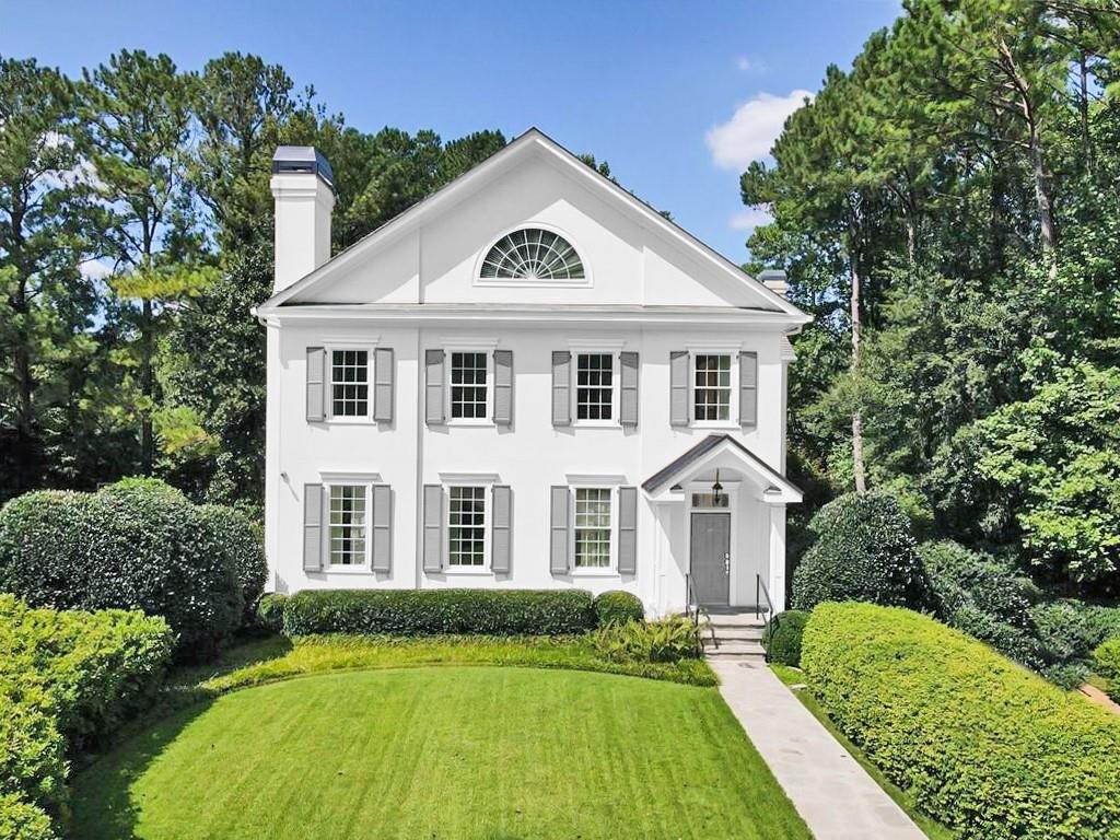 100 West Arden Road Northwest Atlanta, GA 30327 - Photo 1 of 1 a front view of a house with a yard