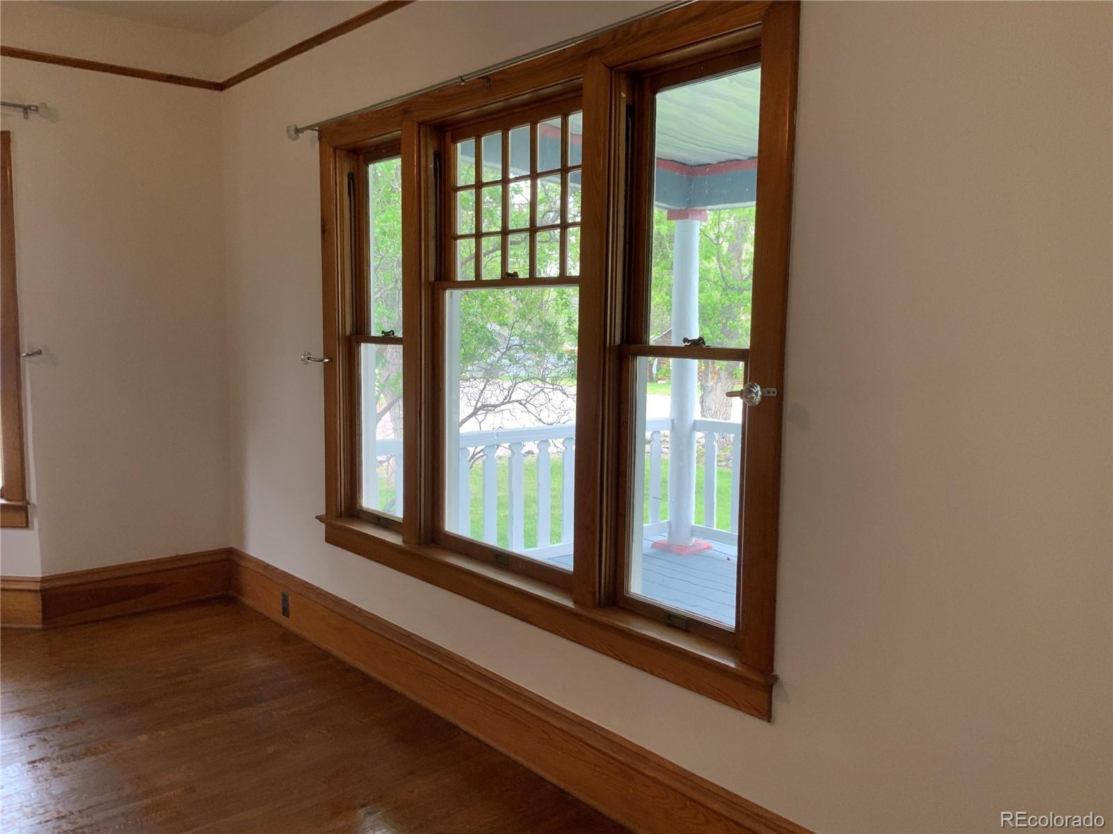 1011 Main Street Meeker, CO 81641 - Photo 5 of 28 a view of a large window with wooden floor