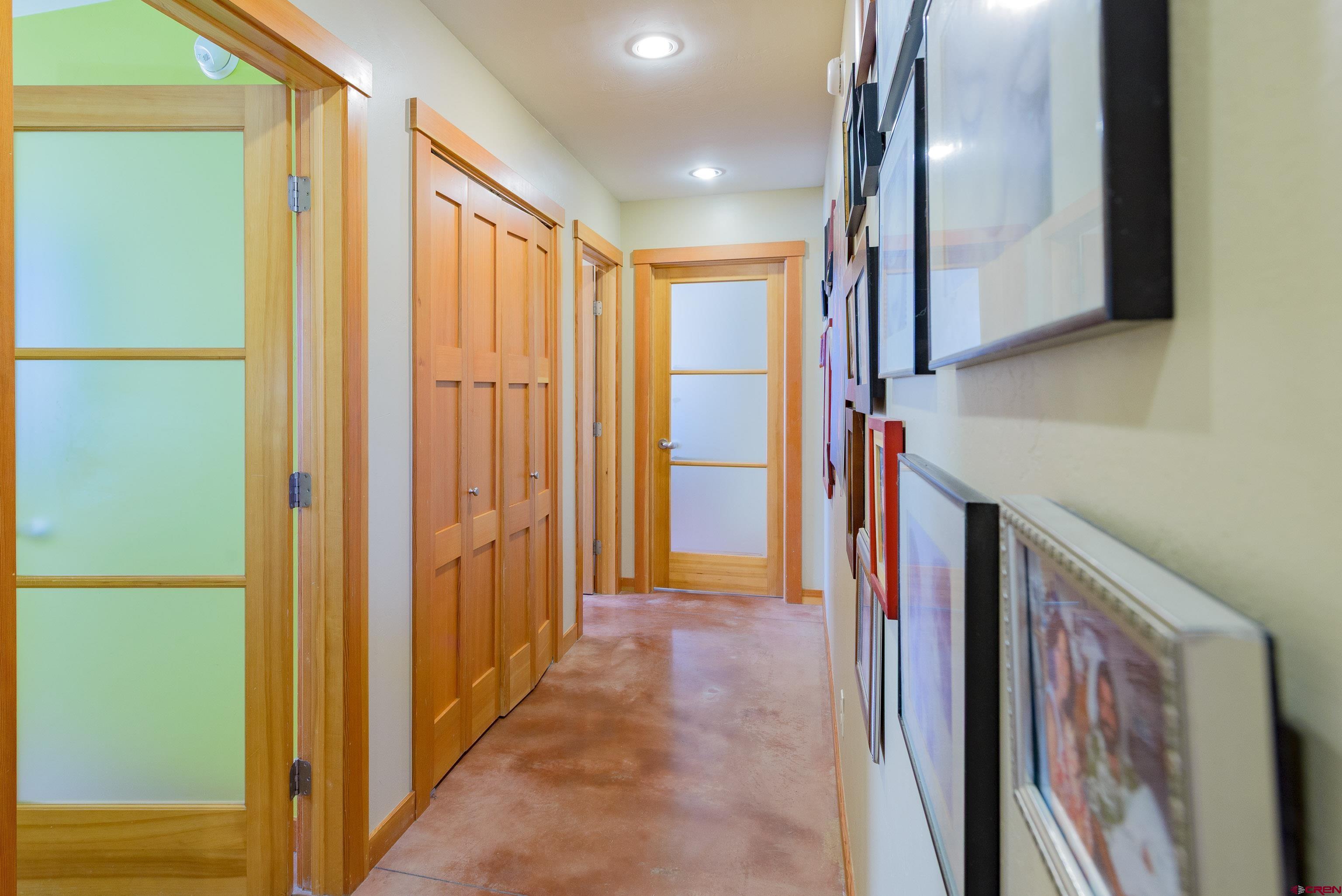 70 Bridle Spur Way Crested Butte, CO 81224 - Photo 21 of 42 a view of hallway with a large window and painted walls