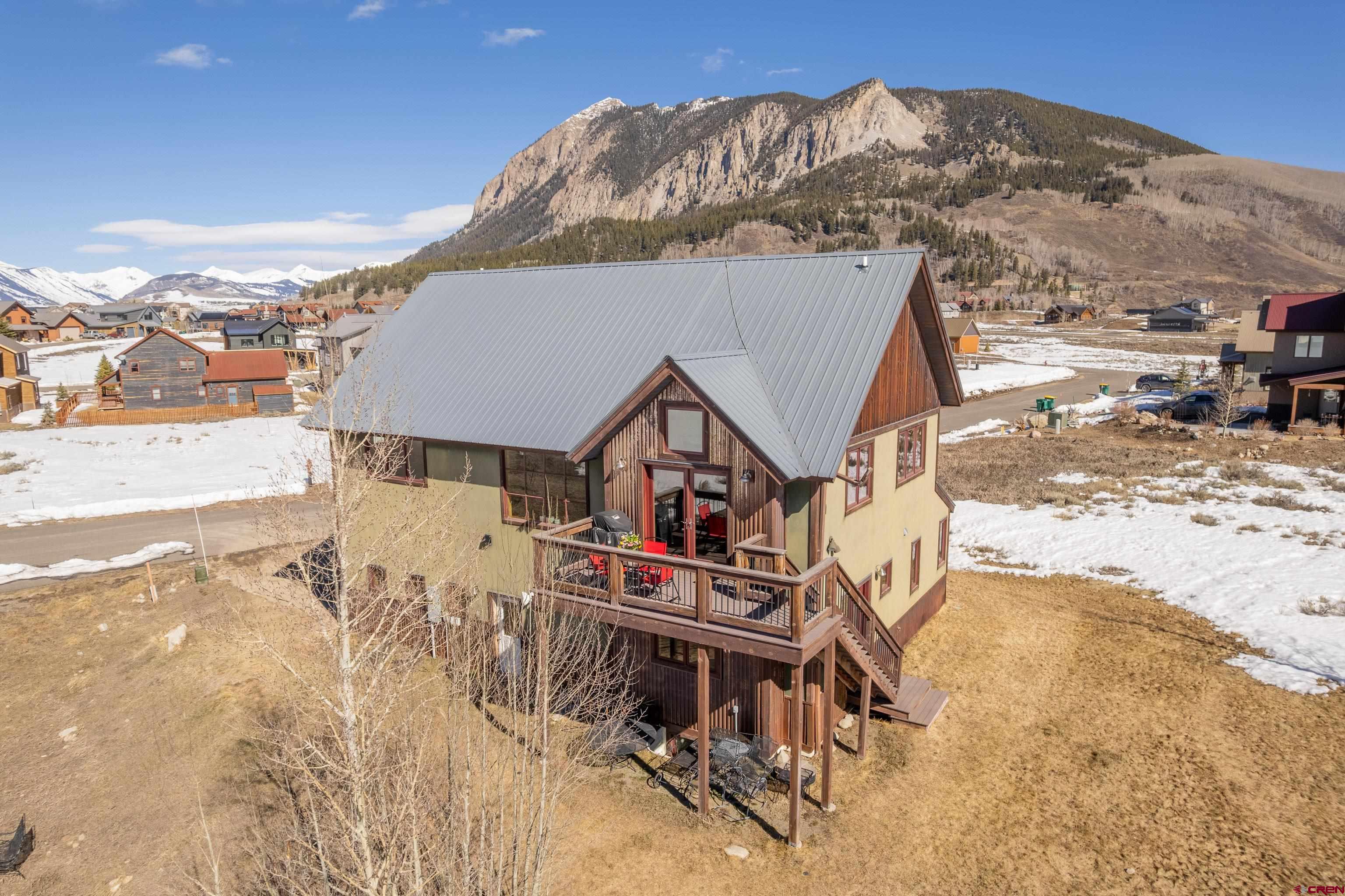 70 Bridle Spur Way Crested Butte, CO 81224 - Photo 29 of 42 a view of a house with a snow in the background