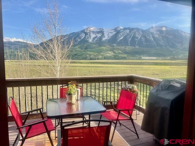 70 Bridle Spur Way Crested Butte, CO 81224 - Photo 34 of 42 a view of a balcony with furniture and a potted plant