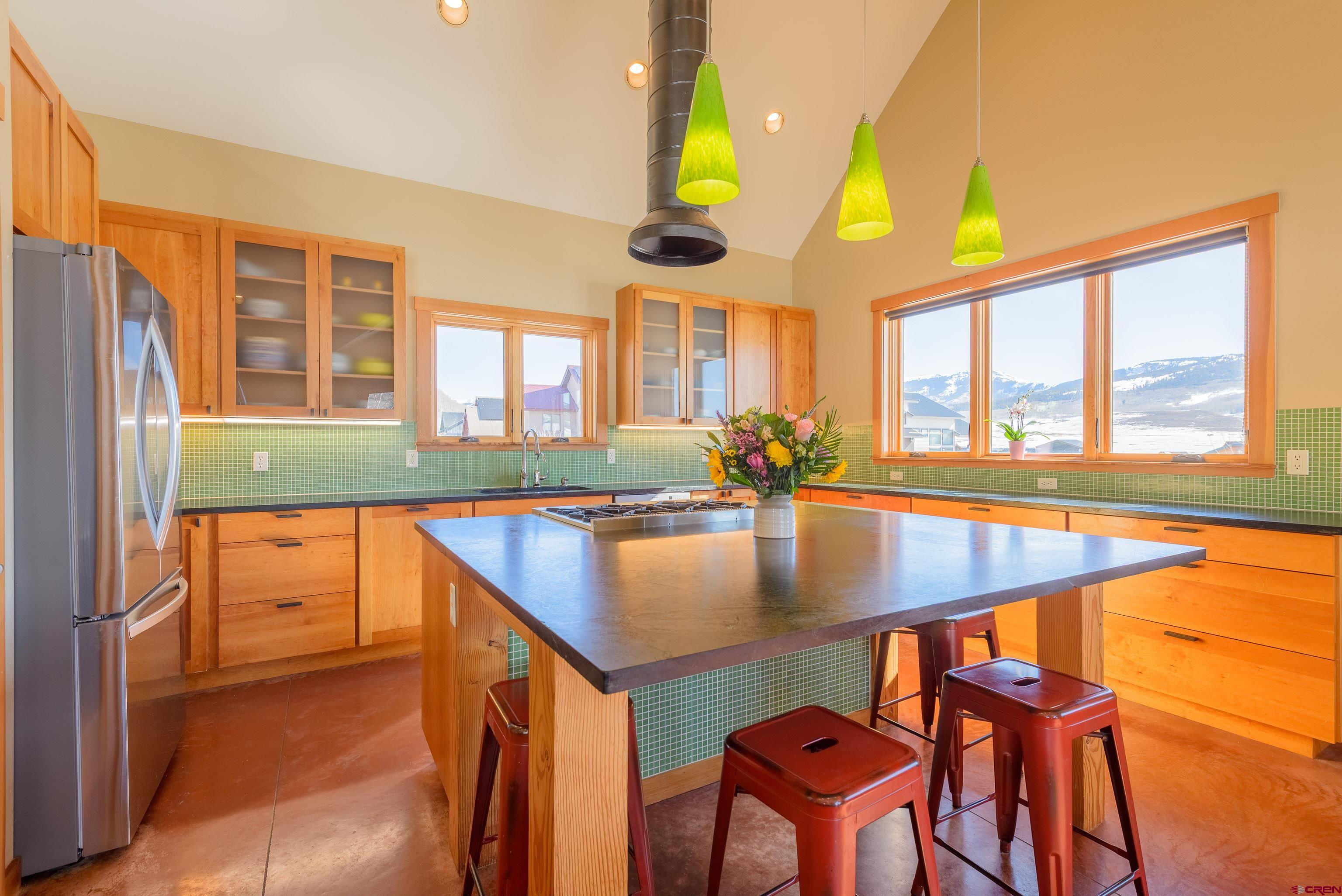 70 Bridle Spur Way Crested Butte, CO 81224 - Photo 4 of 42 a view of a dining room with furniture and a window