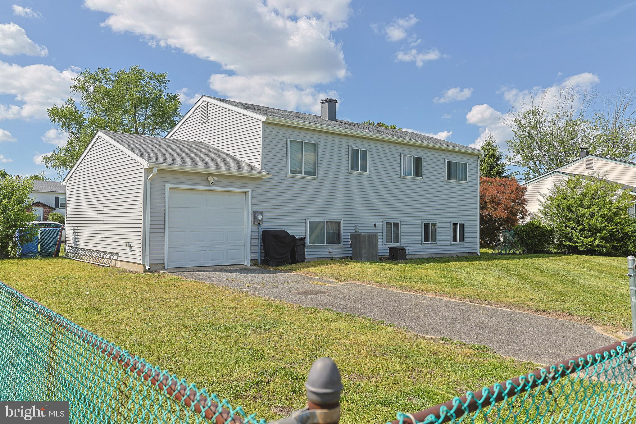 246 Rutgers Avenue Pemberton, NJ 08068 - Photo 3 of 15 a view of a house with a yard and potted plants