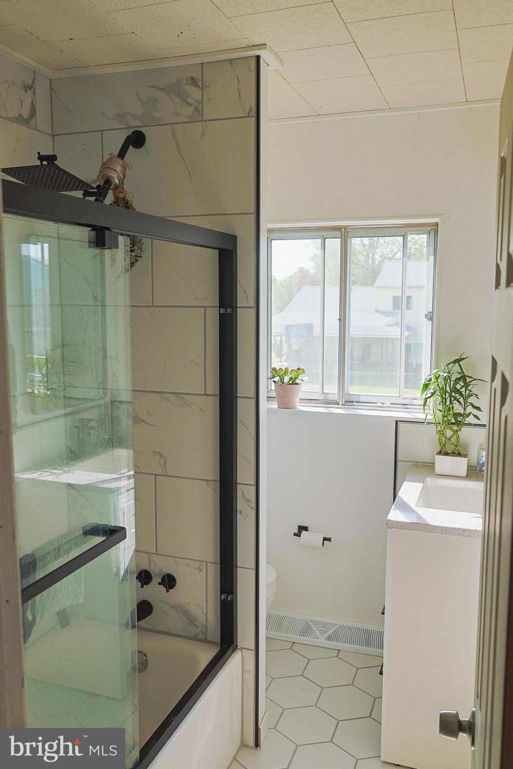 246 Rutgers Avenue Pemberton, NJ 08068 - Photo 5 of 15 a bathroom with a tub and shower