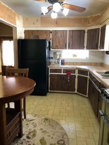 a bedroom with a bed and dresser