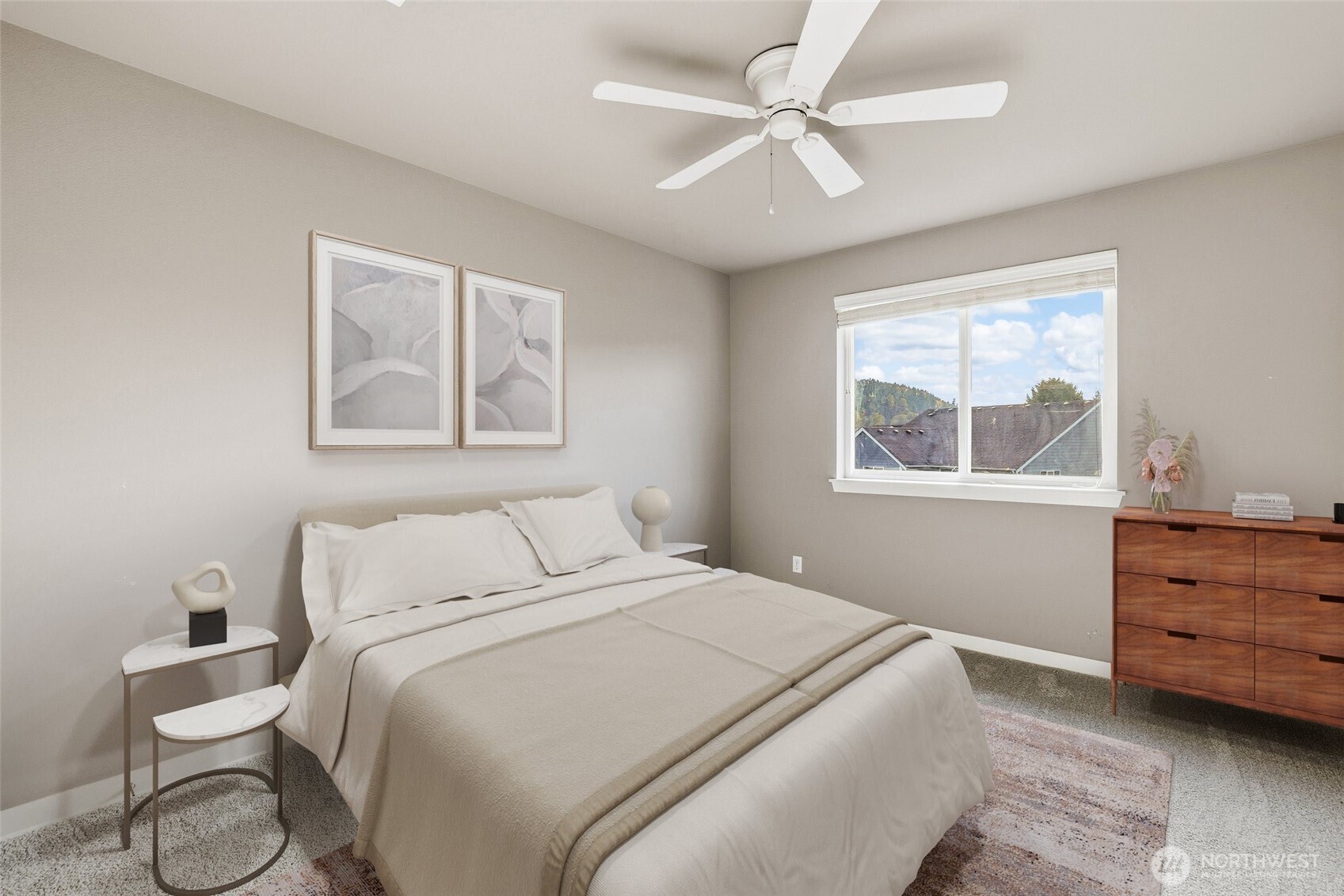 114 Ames Street Northeast Orting, WA 98360 - Photo 19 of 38 a bedroom with a bed and a window