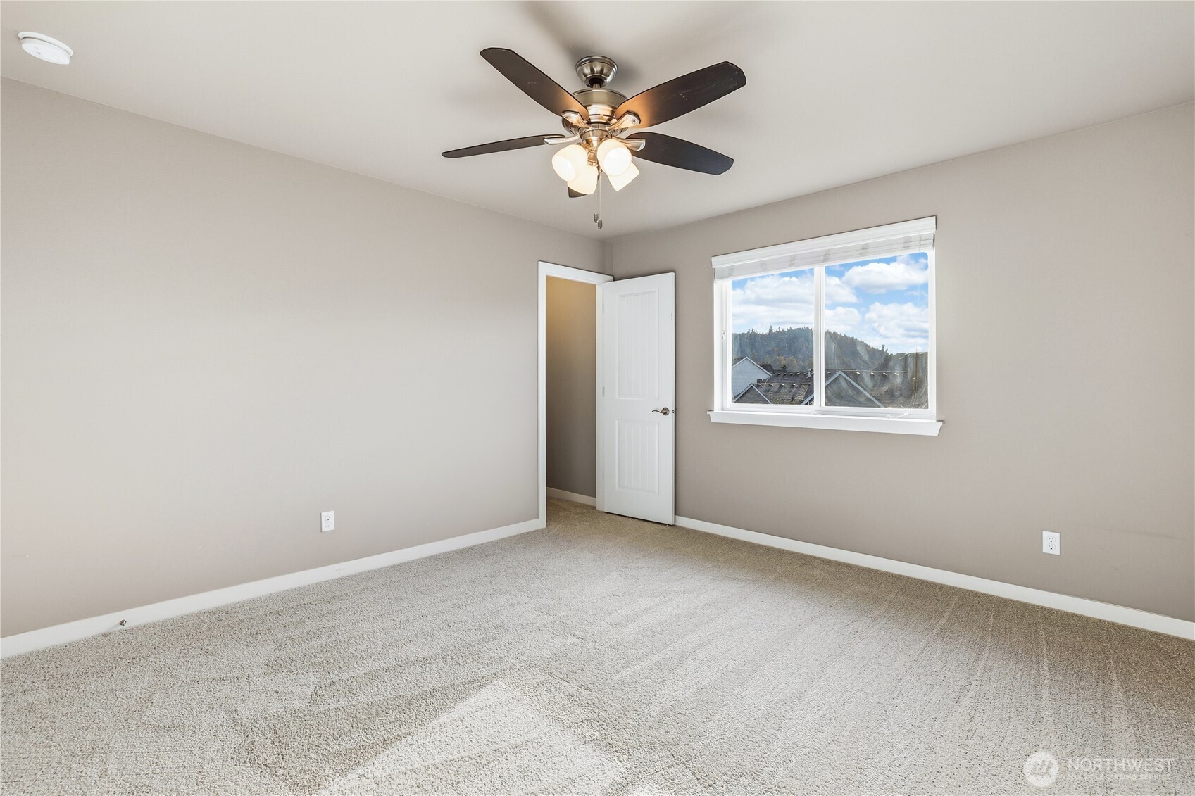 114 Ames Street Northeast Orting, WA 98360 - Photo 20 of 38 a view of an empty room with a window