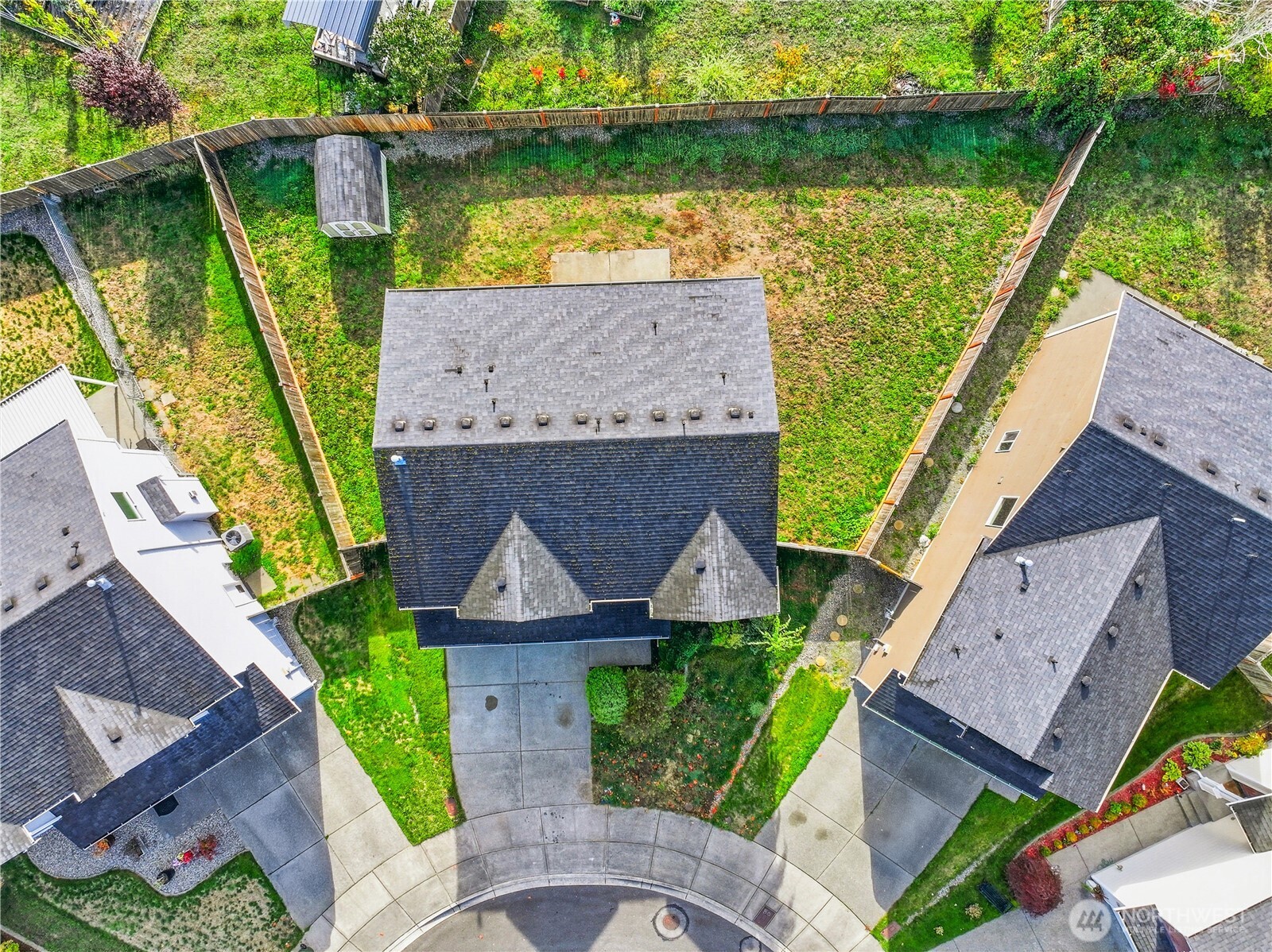 114 Ames Street Northeast Orting, WA 98360 - Photo 29 of 38 an aerial view of a house with a garden and lake view