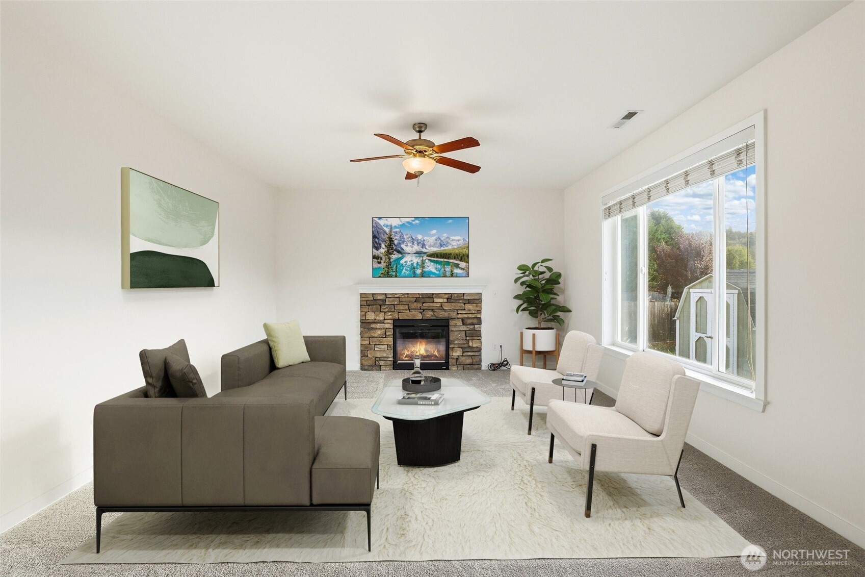 114 Ames Street Northeast Orting, WA 98360 - Photo 3 of 38 a living room with furniture flower pot and a fireplace