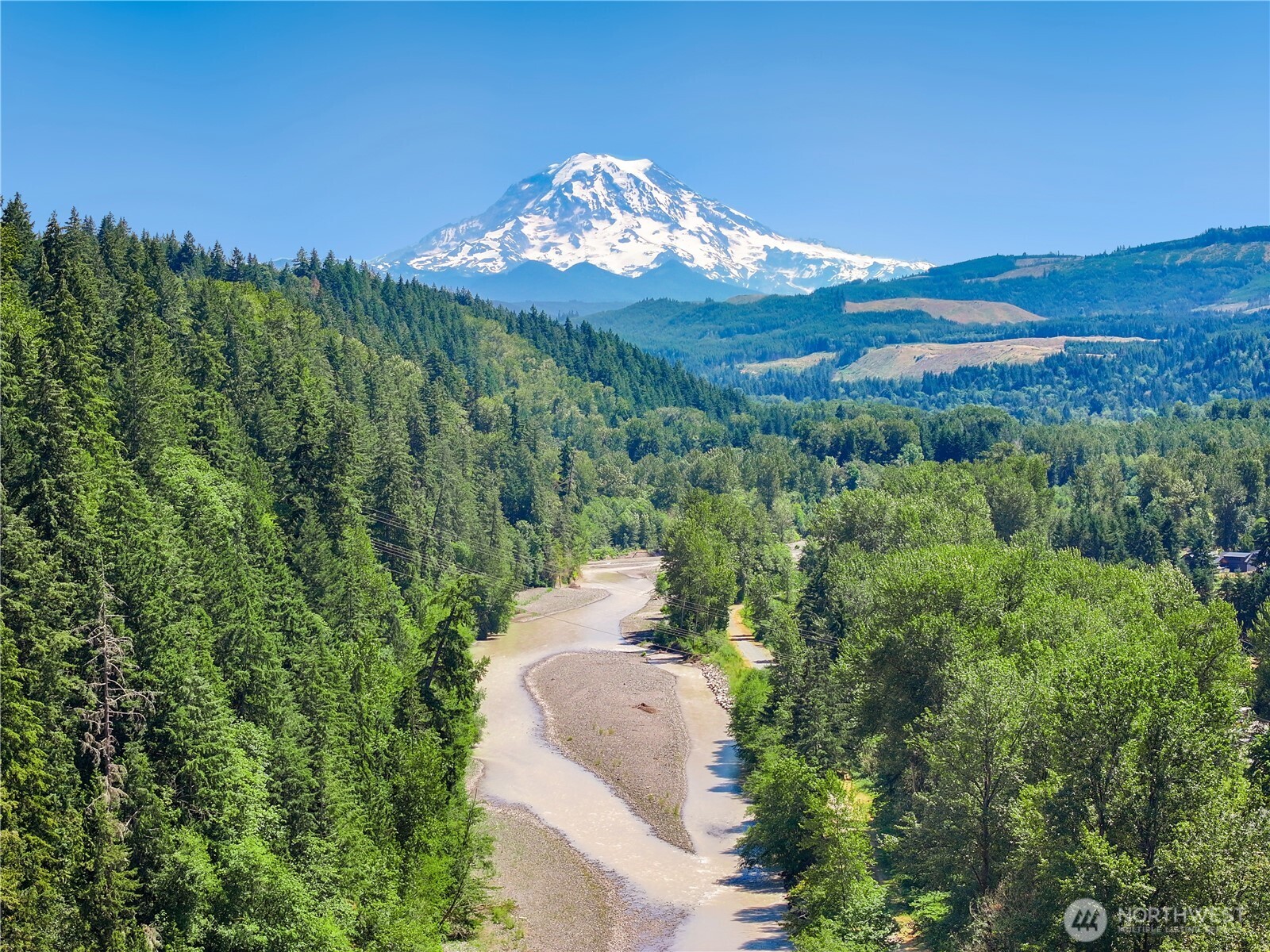 114 Ames Street Northeast Orting, WA 98360 - Photo 37 of 38 a view of a fountain in middle of the green field