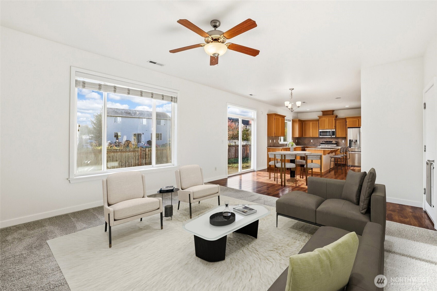 114 Ames Street Northeast Orting, WA 98360 - Photo 4 of 38 a living room with furniture and a table