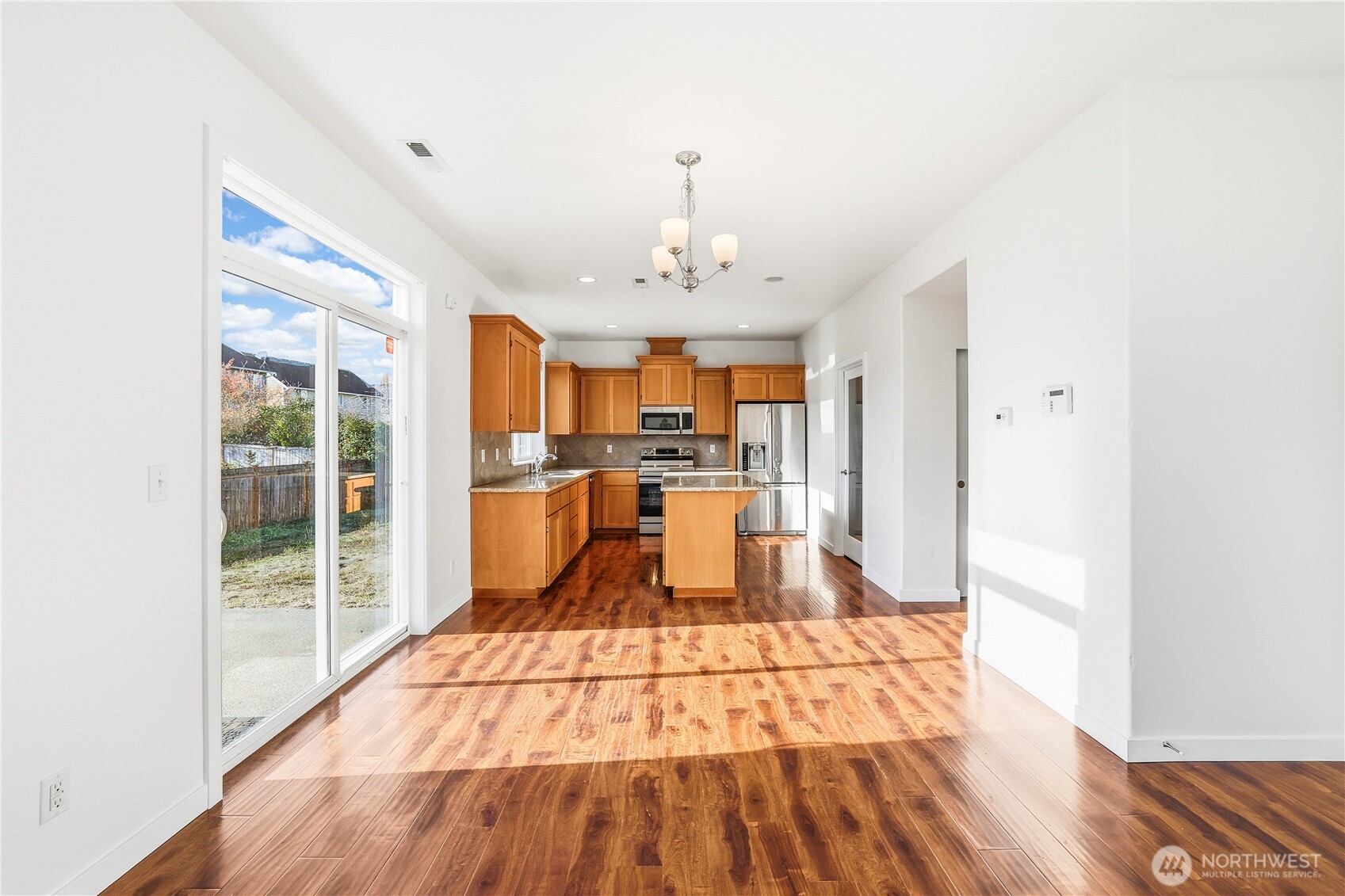 114 Ames Street Northeast Orting, WA 98360 - Photo 6 of 38 a very nice looking room with a large window