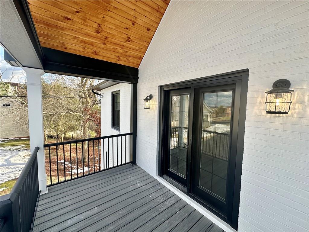 197 West Main Street, Unit 2 Uniontown, PA 15401 - Photo 12 of 13 a view of a porch with wooden floor and outdoor space