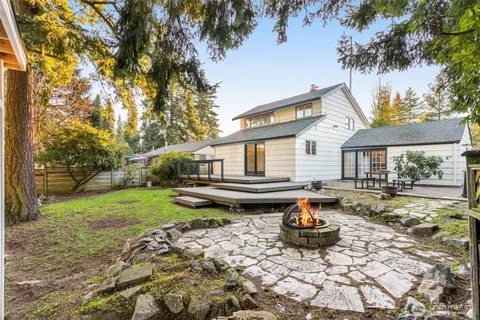 a backyard of a house with seating space