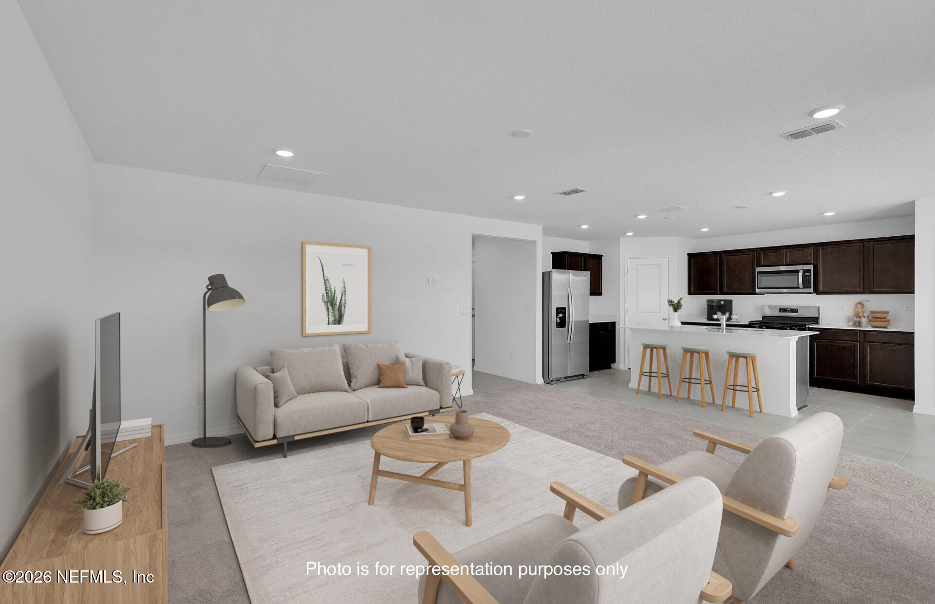 7022 Sandperch Street Jacksonville, FL 32244 - Photo 14 of 29 a living room with furniture and view of kitchen