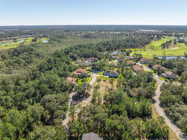 an aerial view of a houses with a outdoor space