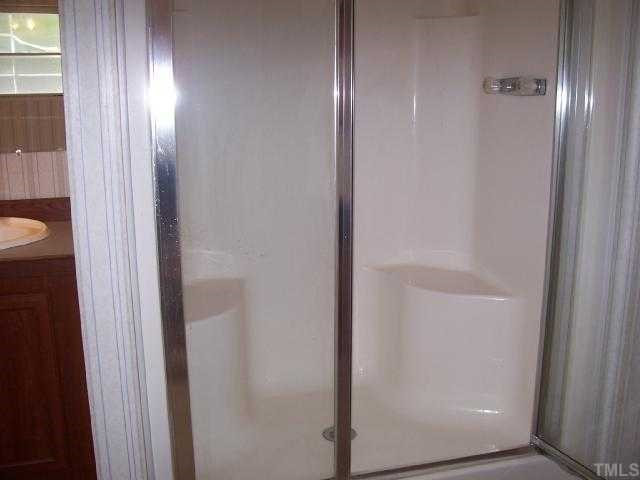 730 Creech Johnson Road Zebulon, NC 27597 - Photo 7 of 12 Over sized shower in master bath, plus soaker tub for a "spa"experience. Master Bath/Spa