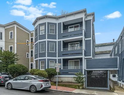 a car parked in front of a building