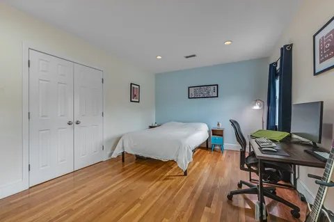 a workspace with furniture and wooden floor