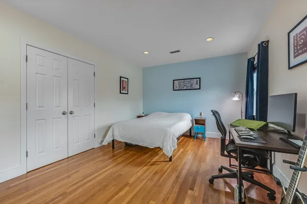 a workspace with furniture and wooden floor